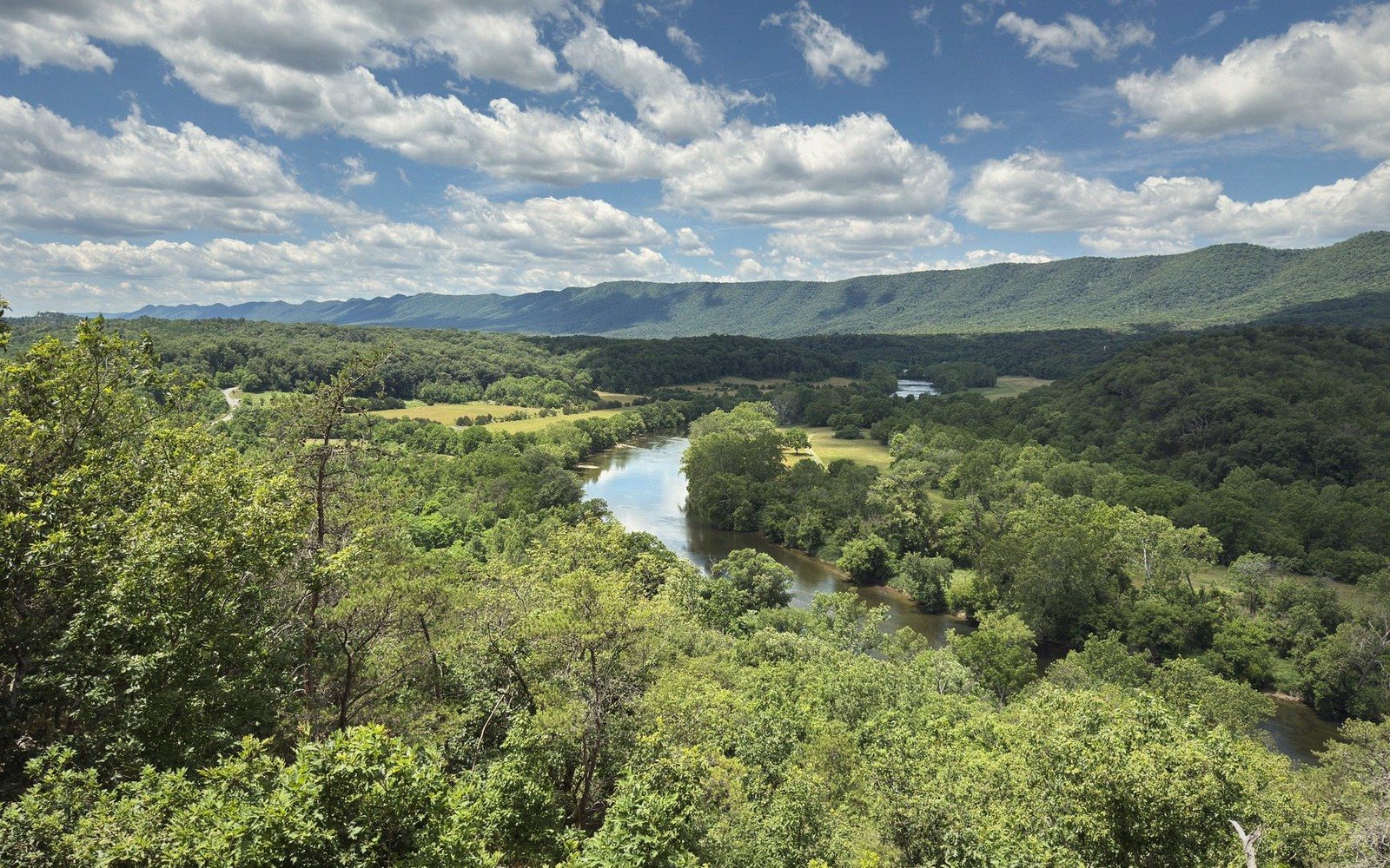 River bend with rocky ledges and clear flowing water